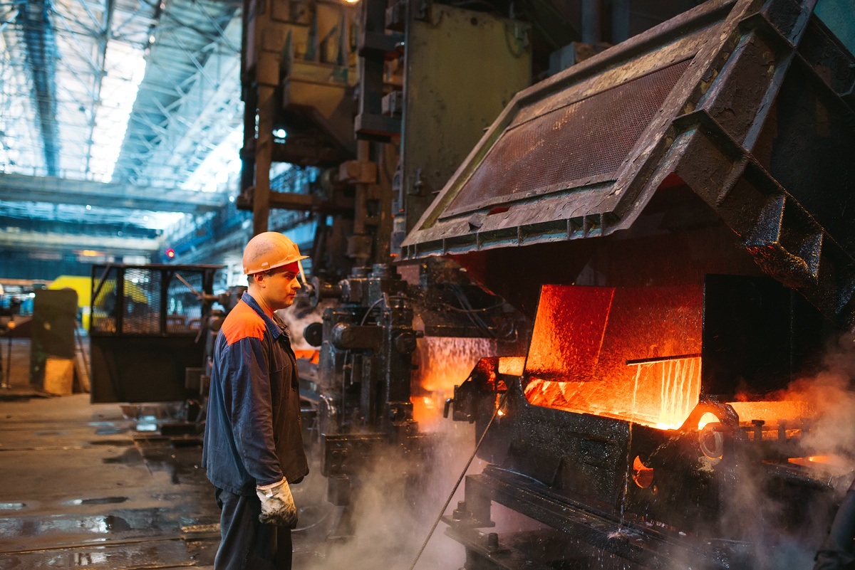 Workers in the steel mill. Metallurgical industry.